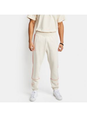 Pantaloni a righe Adidas bianco