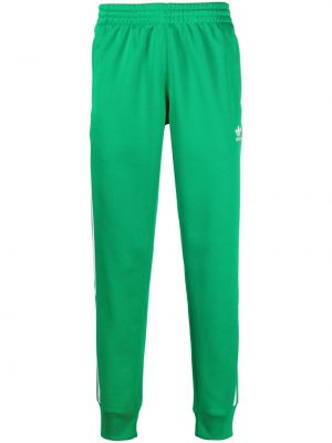 Pantaloni ricamati Adidas verde