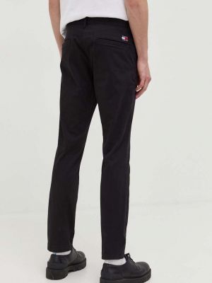 Jednobarevné kalhoty Tommy Jeans černé