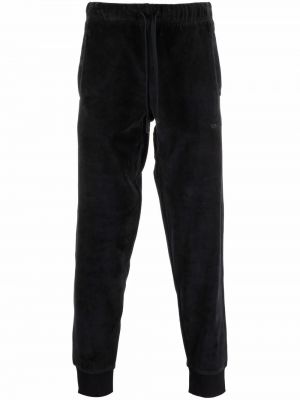 Zamatové teplákové nohavice s výšivkou Carhartt Wip čierna