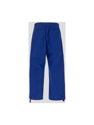 Spodnie bawełniane Versace niebieskie