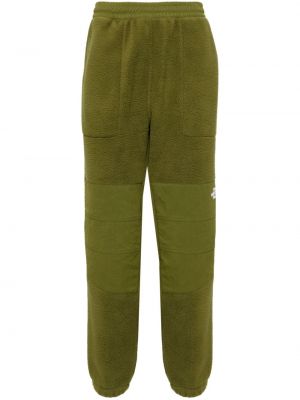 Fleecové teplákové nohavice s výšivkou The North Face zelená