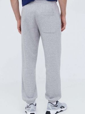 Melanžové sportovní kalhoty Adidas šedé