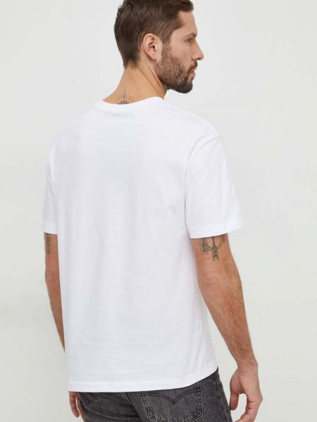 Bavlněné tričko s potiskem Calvin Klein Jeans bílé