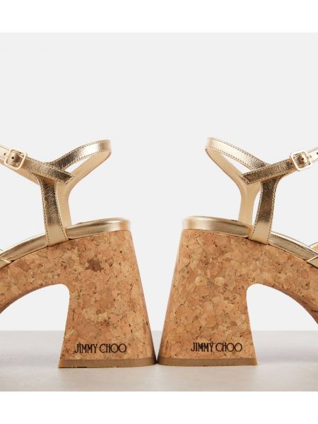 Iš natūralios odos sandalai ant pleištinio kulniuko Jimmy Choo auksinė
