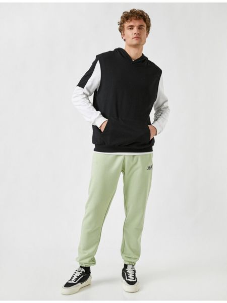 Teplákové nohavice Koton zelená