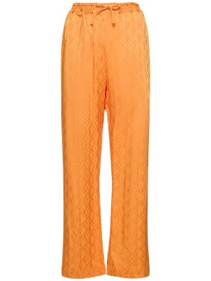 Relaxed fit satenaste hlače iz žakarda Marine Serre oranžna