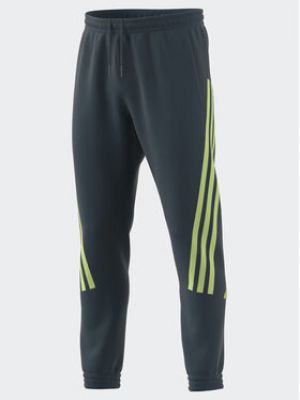 Pruhované slim fit sportovní kalhoty Adidas