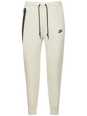 Slim fit fleecové priliehavé teplákové nohavice Nike