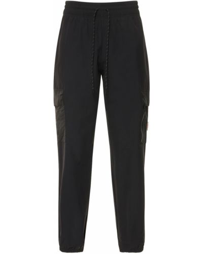 Pletené cargo kalhoty z nylonu Nike černé