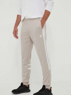 Панталон с апликация Adidas Originals бежово