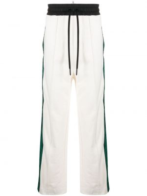 Pruhované bavlnené teplákové nohavice Moncler Grenoble biela