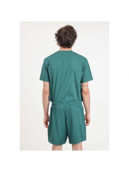 Pantalones cortos de malla New Balance verde