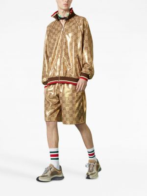 Vējjaka ar rāvējslēdzēju džersija Gucci zelts