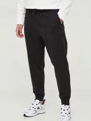 Sportovní kalhoty Armani Exchange černé