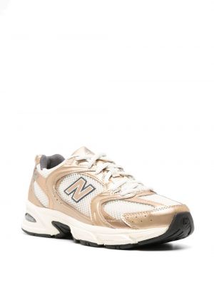 Sneakersy New Balance 530 złote