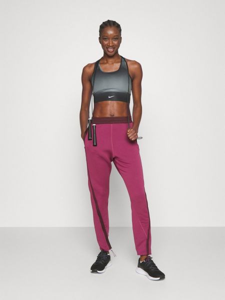 Spodnie sportowe Nike Performance bordowe