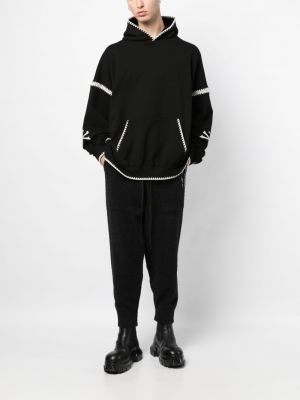 Spodnie sportowe polarowe z nadrukiem Mastermind World czarne