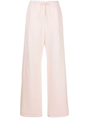 Fleecové sportovní kalhoty s výšivkou Nike růžové
