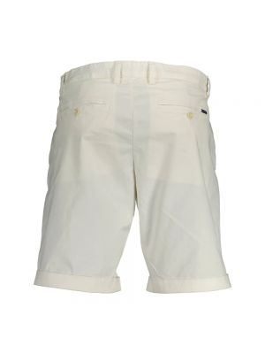 Jeansy bawełniane Gant białe