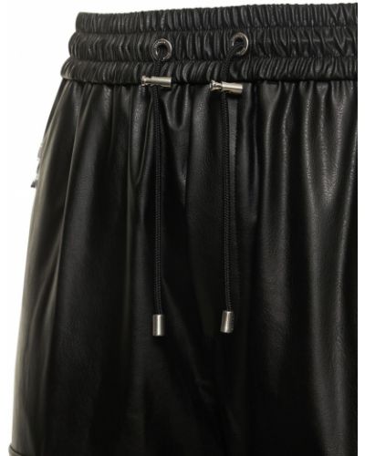 Kožené cargo kalhoty z imitace kůže Balmain černé
