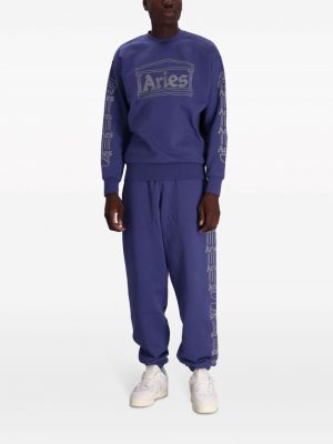 Spodnie sportowe bawełniane z nadrukiem Aries niebieskie