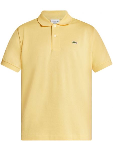 Bombažna polo majica z vezenjem Lacoste rumena