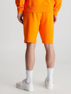 Pantaloni scurți din denim Calvin Klein Jeans portocaliu