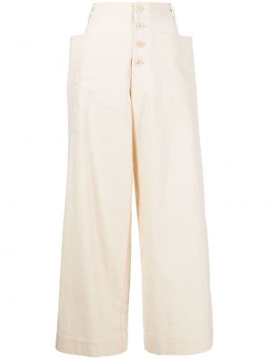 Bavlněné zvonové kalhoty s knoflíky s páskem Toogood - béžová