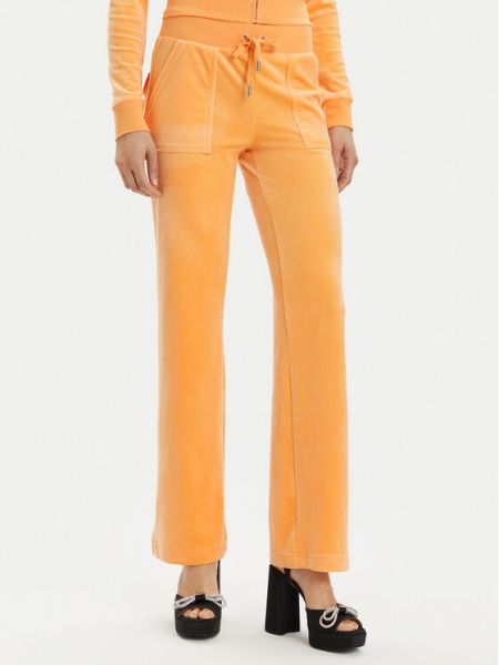 Priliehavé teplákové nohavice Juicy Couture oranžová