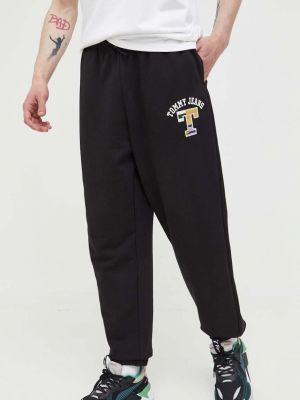 Spodnie sportowe bawełniane Tommy Jeans czarne