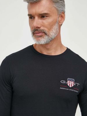 Bavlněné tričko s dlouhým rukávem s dlouhými rukávy s aplikacemi Gant černé