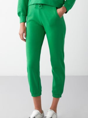 Slim fit teplákové nohavice Grimelange zelená