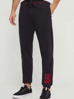 Bavlněné kalhoty s aplikacemi Hugo černé