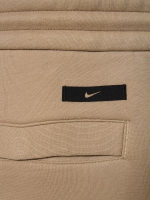Pantaloni din fleece Nike kaki