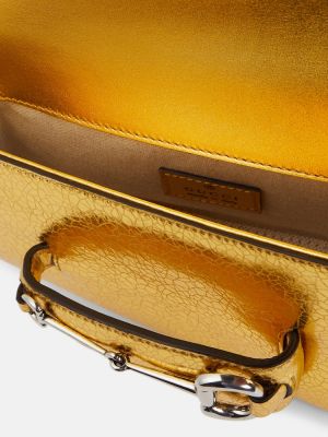 Kožená kabelka Gucci zlatá