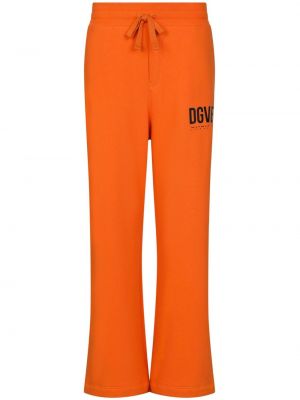 Bavlnené teplákové nohavice s potlačou Dolce & Gabbana Dgvib3 oranžová