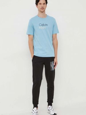 Spodnie sportowe bawełniane z nadrukiem Calvin Klein czarne