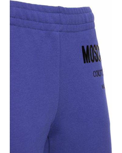 Памучни спортни панталони от джърси Moschino виолетово