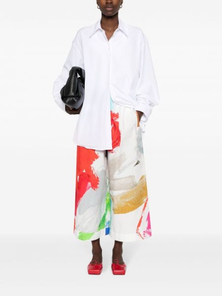 Kalhoty s potiskem s abstraktním vzorem Daniela Gregis bílé