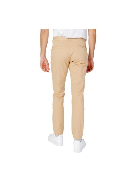 Pantalones chinos con cremallera de algodón Tommy Jeans beige