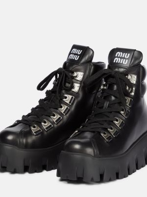 Кожени обувки до глезена на платформе Miu Miu черно