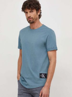 Тениска с дълъг ръкав с апликация Calvin Klein Jeans синьо