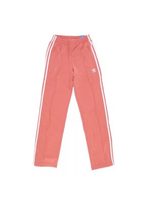 Spodnie sportowe w miejskim stylu Adidas różowe