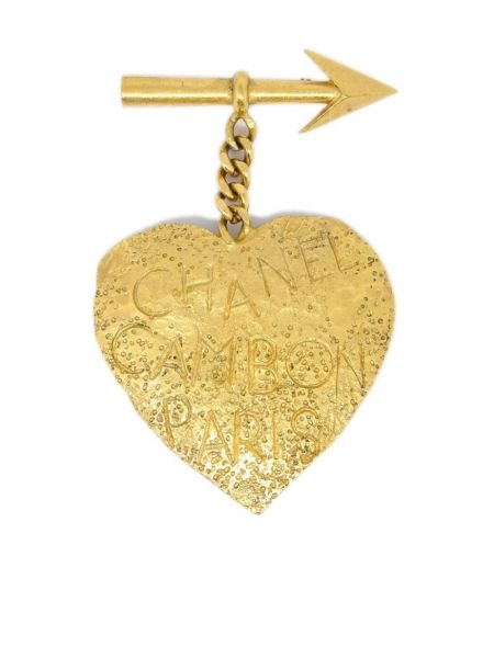 Broš s mašnom s uzorkom srca Chanel Pre-owned zlatna
