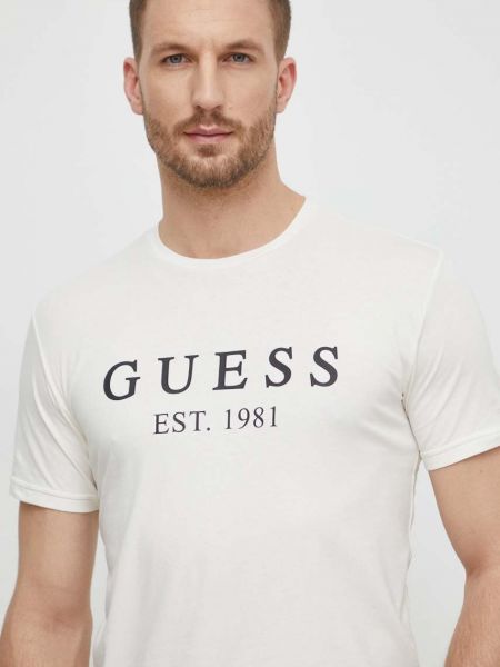 Koszulka z nadrukiem Guess beżowa