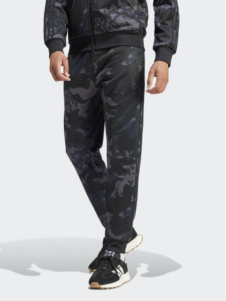 Priliehavé teplákové nohavice Adidas čierna