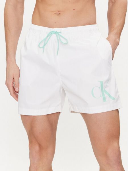 Priliehavé šortky Calvin Klein Swimwear biela