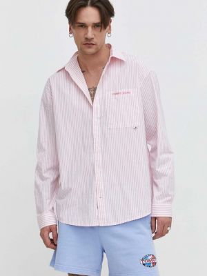 Koszula jeansowa bawełniana relaxed fit Tommy Jeans różowa