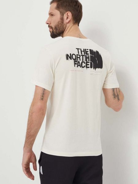 Koszulka bawełniana z nadrukiem The North Face beżowa